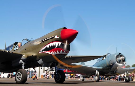 An image of P40E Kittyhawk and Dauntless ready to take off