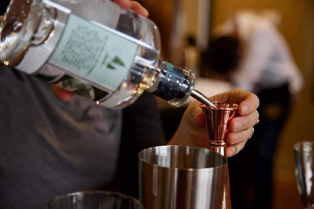 oregonspiritdistillers-Instagram-2465-ig-17864713634374605-medium pouring a shot of gin in a shaker