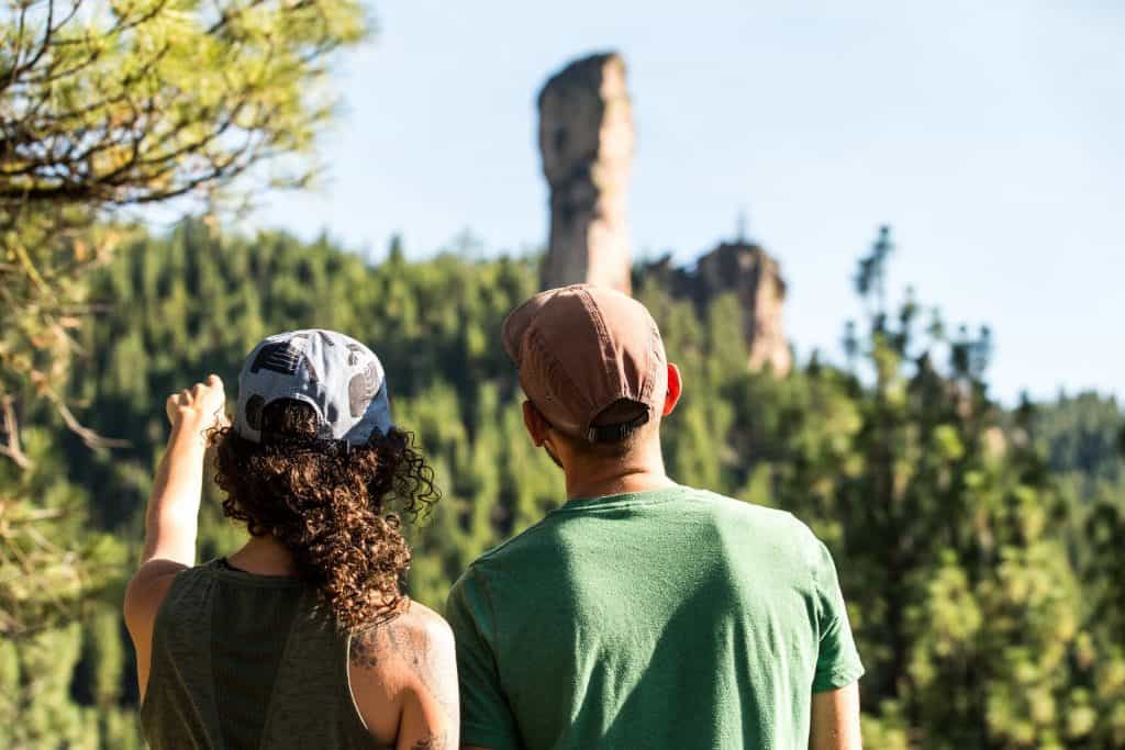 outdoor-adventure travel photography by steve heinrichs_-3-large Couple points at Steins Pillar near Prineville, Oregon