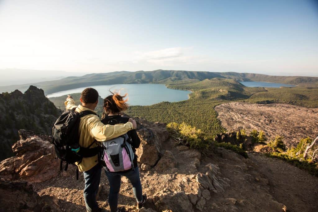 outdoor-adventure travel photography by steve heinrichs_-44-large Couple standing on Paulina Peak points out at the Newberry National Volcanic Monument near La Pine, Oregon