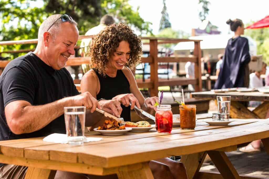 steve-heinrichs-photography-43-large couple eating a casual breakfast outdoors