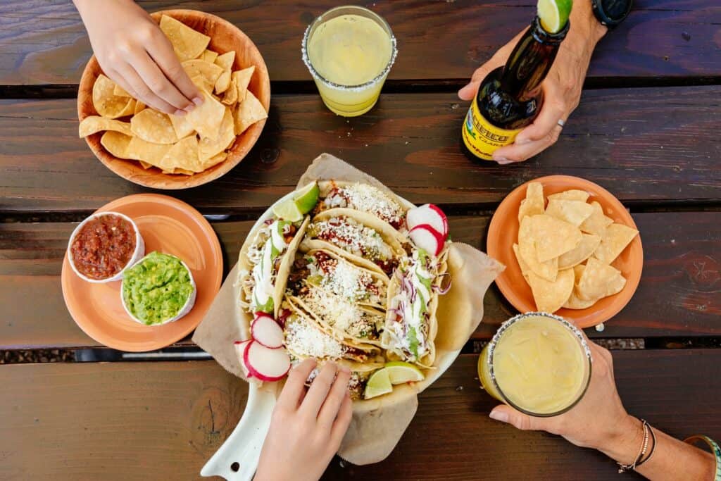 2021-06-22-VCO-Sunriver-121-large foodie shot of tacos, chips and guac, and mexican bevs
