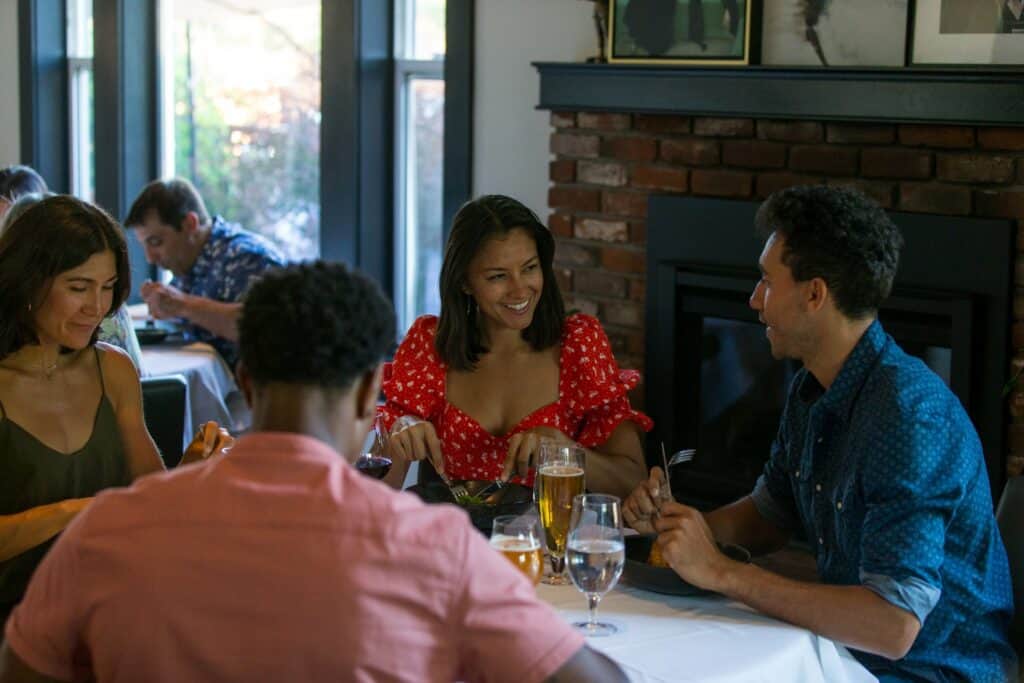 steve-heinrichs-photography-155-large two couples enjoying a dinner at a fine dining restaurant
