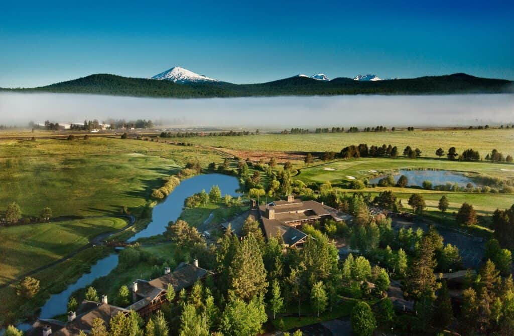 An aerial view of Sunriver Lodge and its surrounding scenery in the town of Sunriver, Oregon.