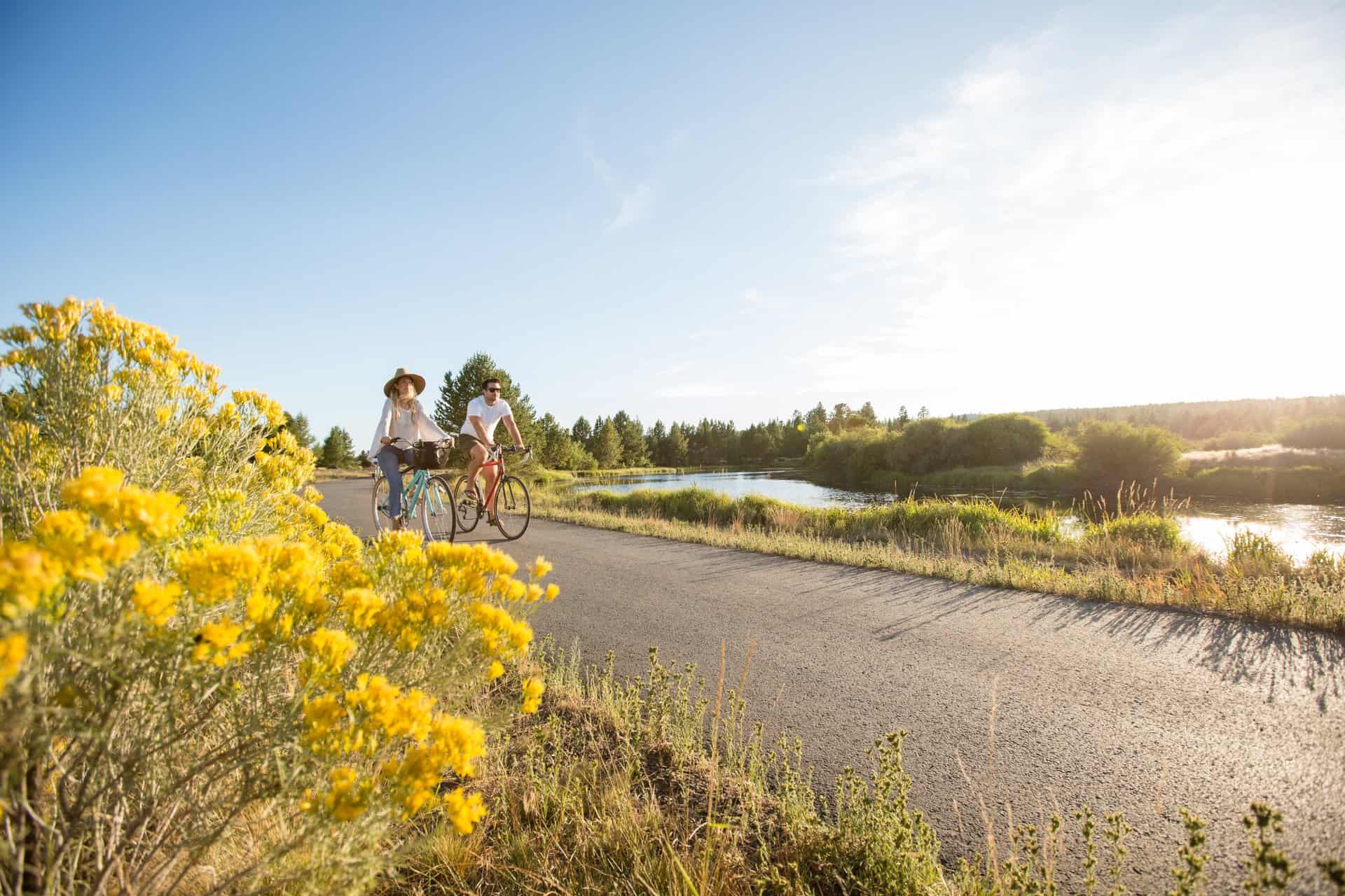 outdoor-adventure travel photography by steve heinrichs_-83-large Two people ride bikes through Sunriver Resort on a sunny day in Central Oregon