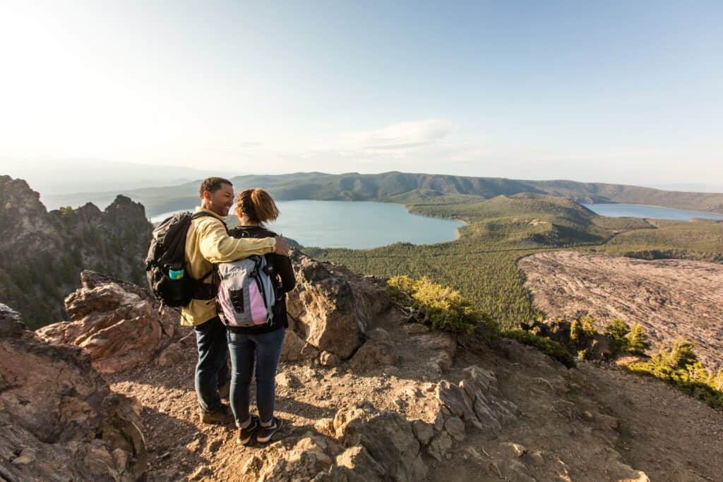 A man and a teenager fishing at Paulina Lake in the Newberry National Volcanic Monument