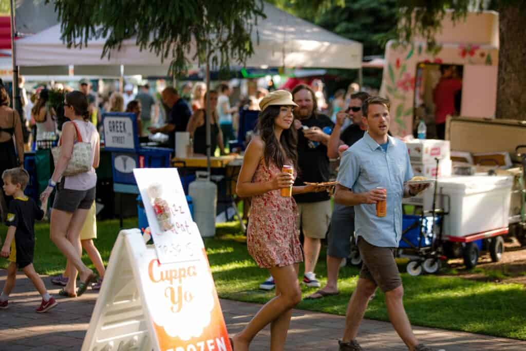 outdoor-adventure travel photography by steve heinrichs_-40-large Couple in their late 20s walking around farmers market in Bend, Oregon
