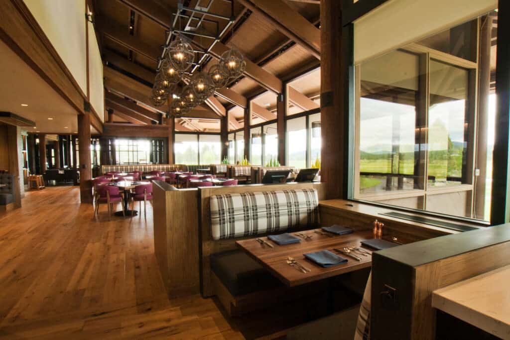 Carsons-Interior-Shoot-(23) bench sitting and big windows of Carson’s dining space at Sunriver Resort
