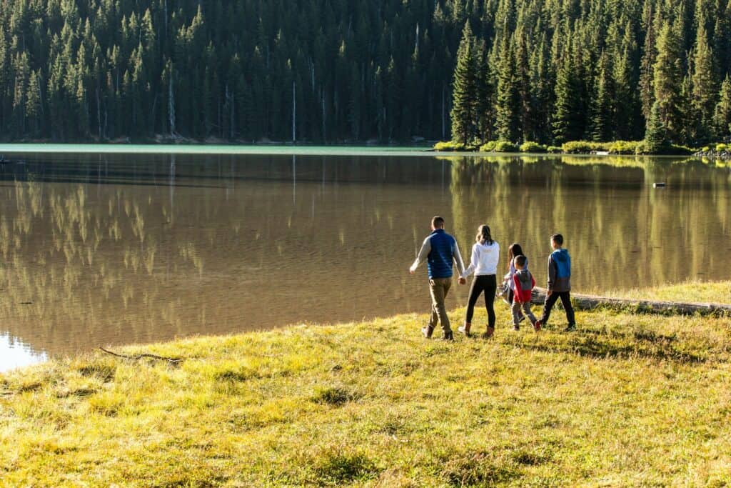 Family hiking at Todd Lake near Bend, Oregon
