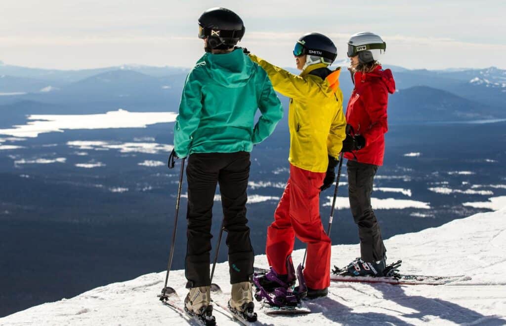 photography by steve heinrichs-5-large (1) Three women look out at view from the top of Mt. Bachelor in Bend, Oregon.