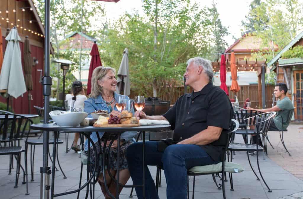 bend-oregon-lifestyle-photography-by-steve-heinrichs_-62-medium a couple enjoying a meal outside in Sisters, OR