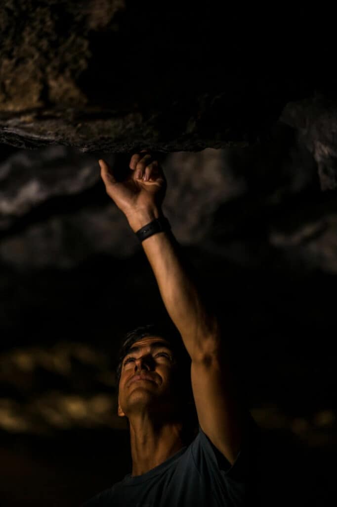 steve heinrichs photography-29-medium (1) A guy explores a dark cave.