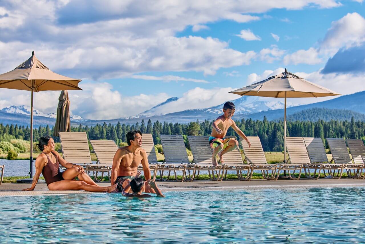 Family around a pool at Black Butte Ranch near Sisters, Oregon
