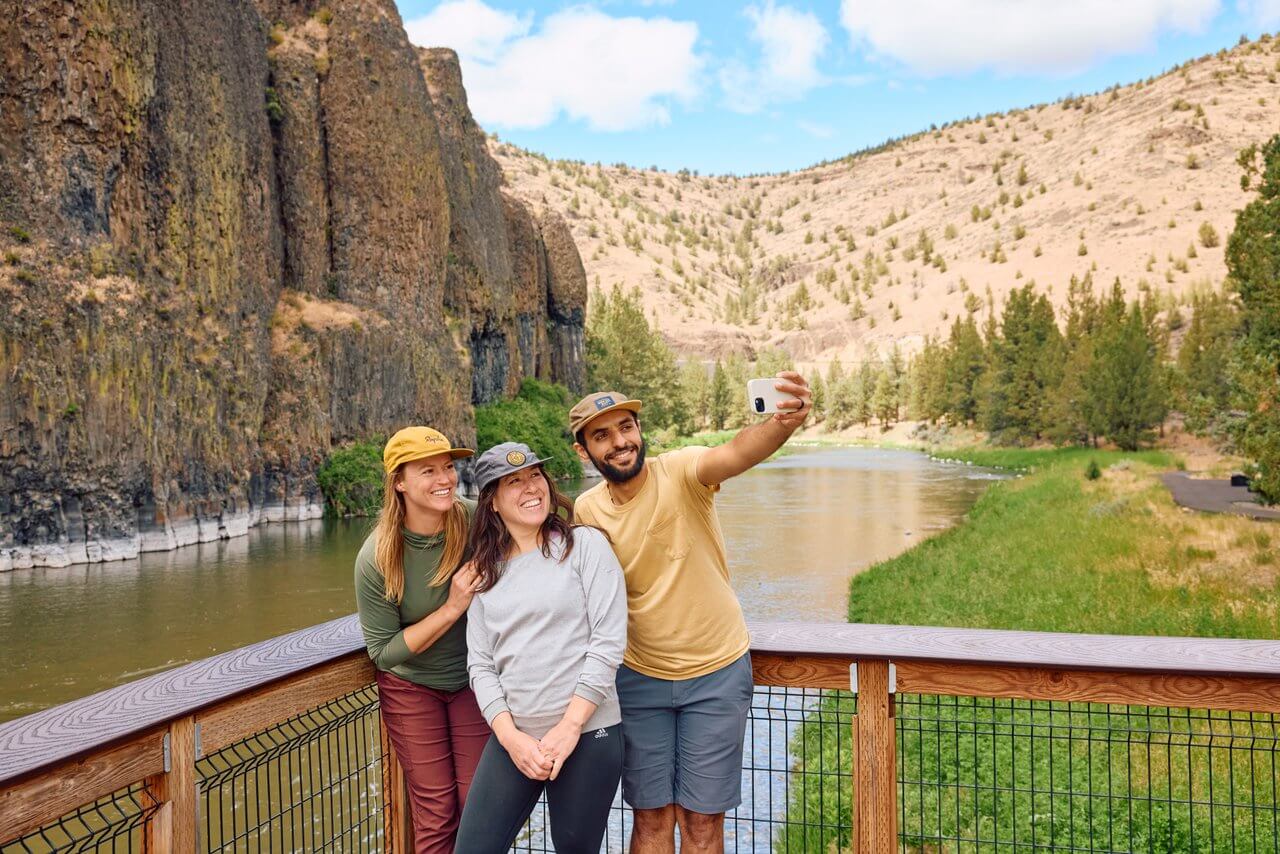 Hikers on the Chimney Rock Trail along the Crooked River near Prineville, Oregon Hikers on the Chimney Rock Trail along the Crooked River near Prineville, Oregon